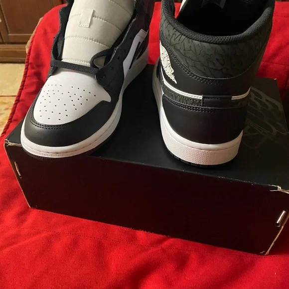Jordan 1 Mid Black and White Athletic Shoes New never worn.
